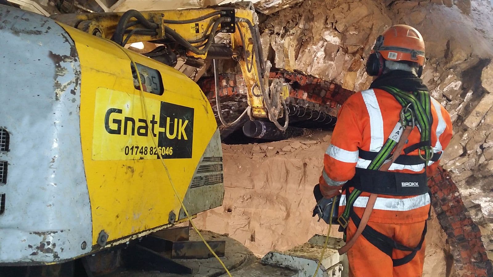 Adapted Brokk 330 'Fillie' demolition robot mounted inside a 9 metre diameter TBM at the Farnworth Tunnel