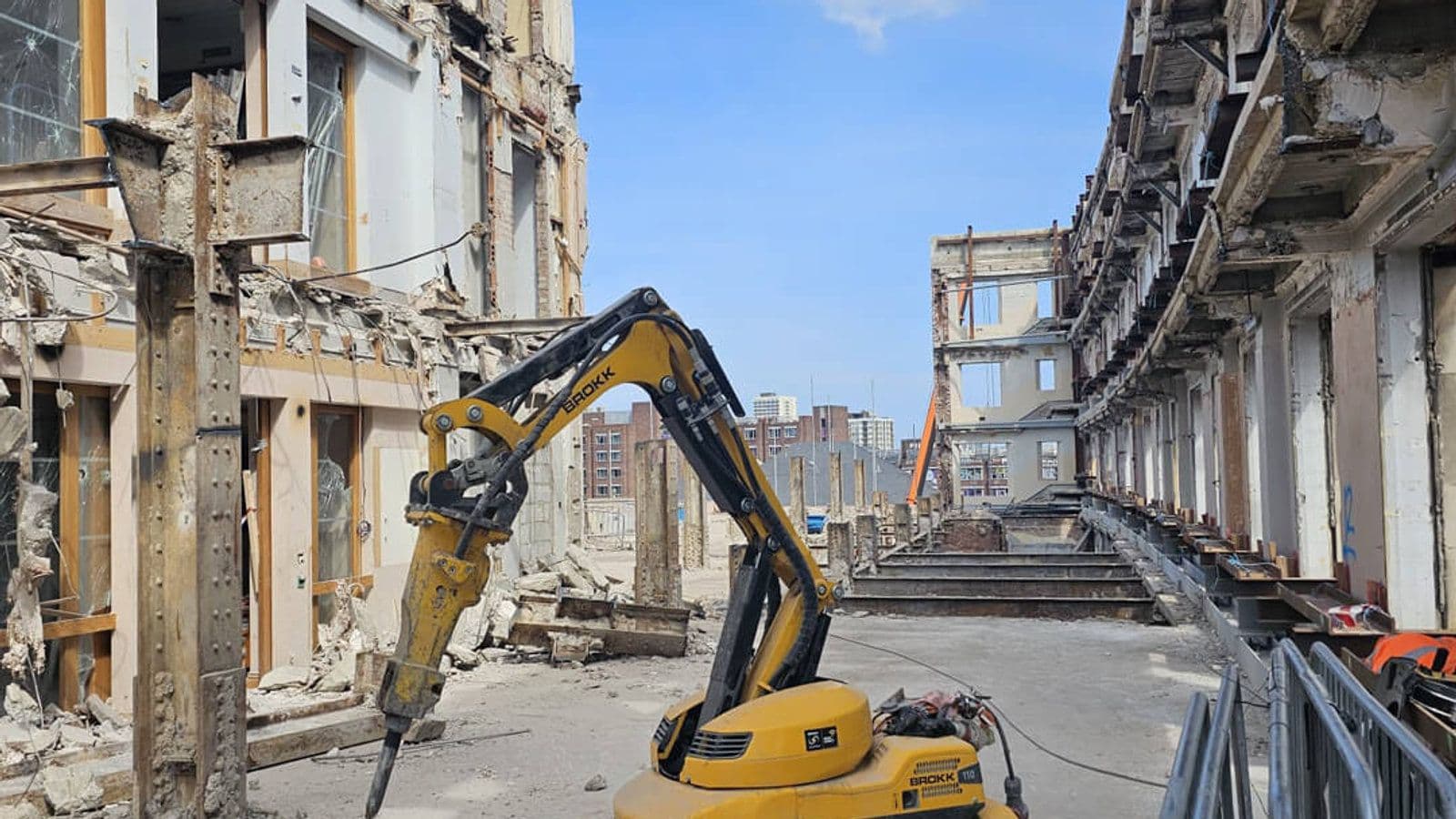 Facade retention scheme with original building elevation preserved as the interior is deconstructed